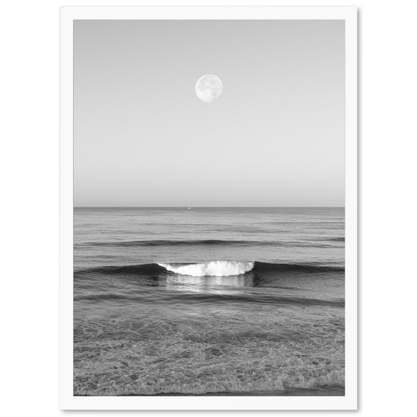 a black and white photo of a wave in the ocean