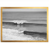 a black and white photo of a wave in the ocean