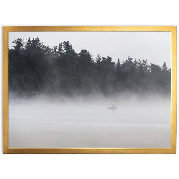 a picture of a person on a surfboard in the fog