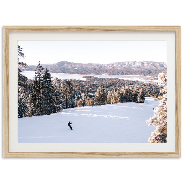 a picture of a person skiing down a hill