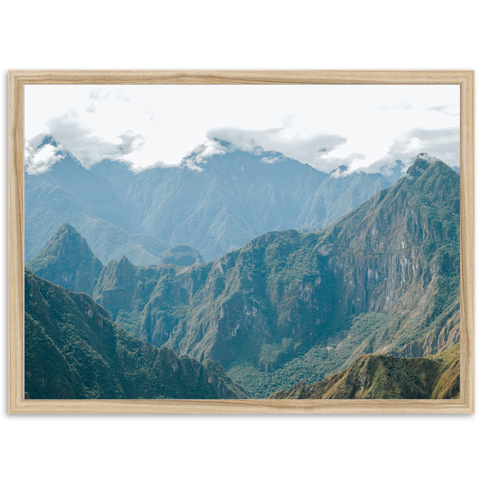 a picture of a mountain range taken from the top of a hill