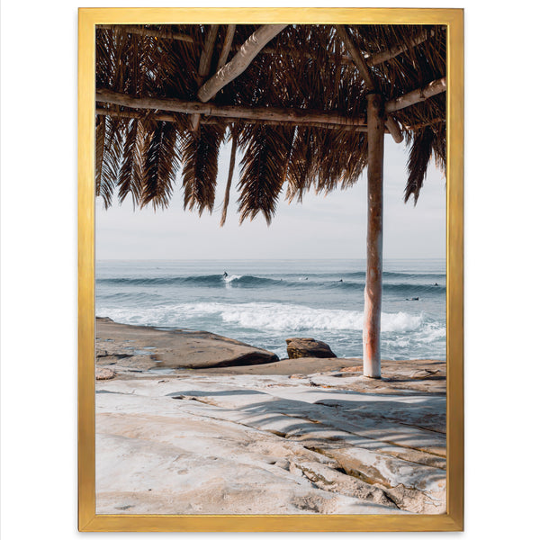 a picture of a beach with waves coming in from the ocean