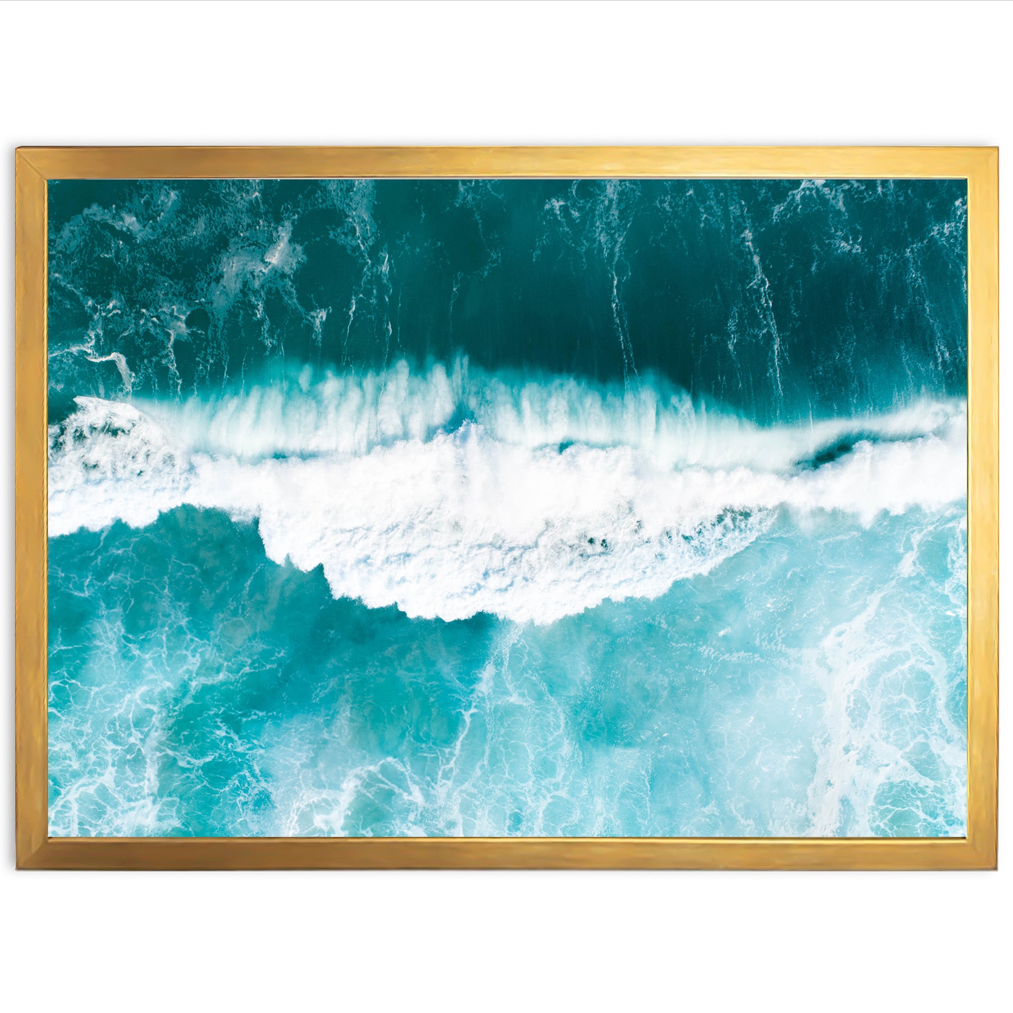 an aerial view of a blue ocean with waves