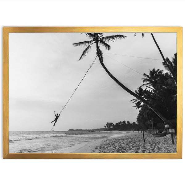 a black and white photo of a person on a rope