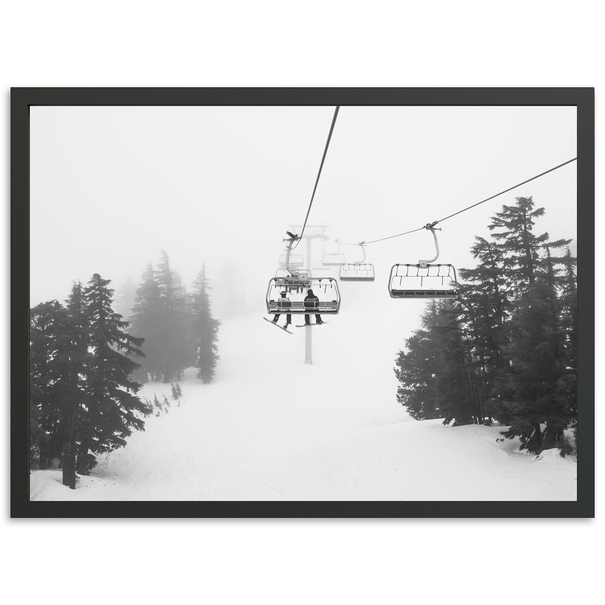 a black and white photo of a ski lift