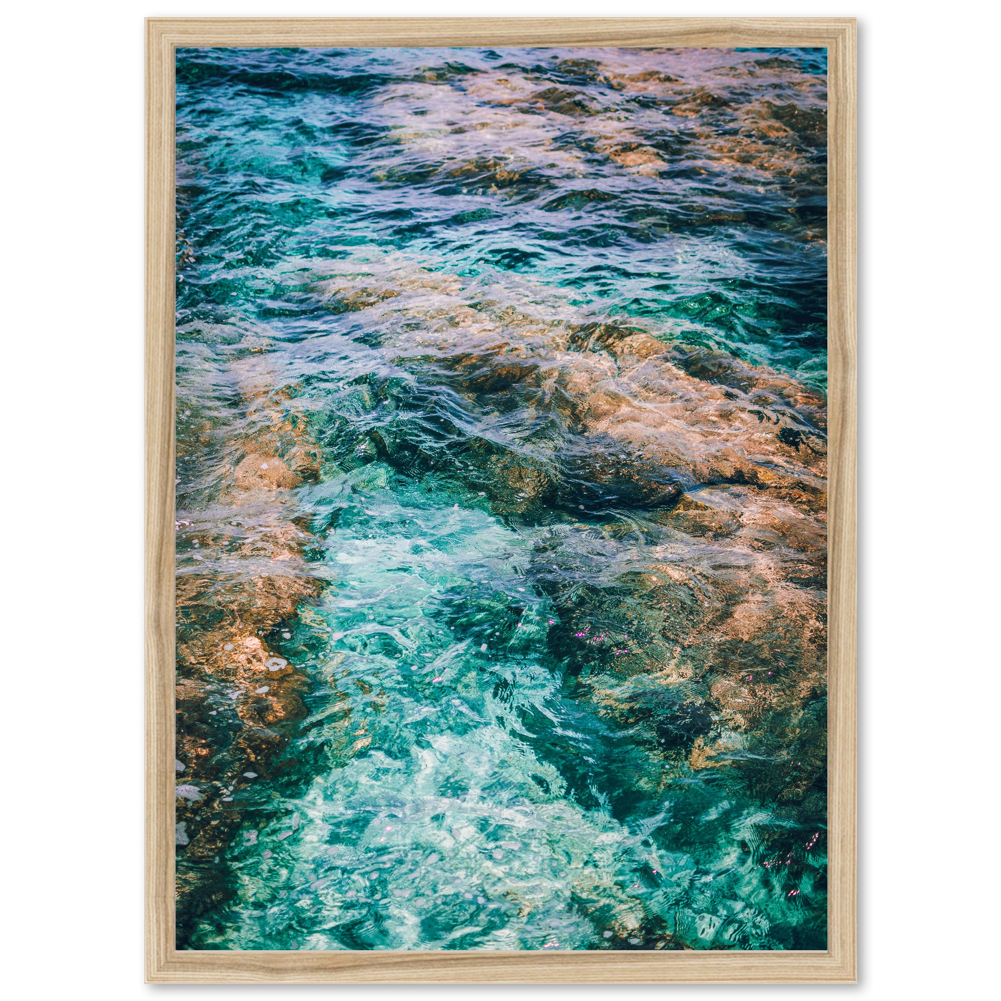 a picture of a body of water with rocks in it