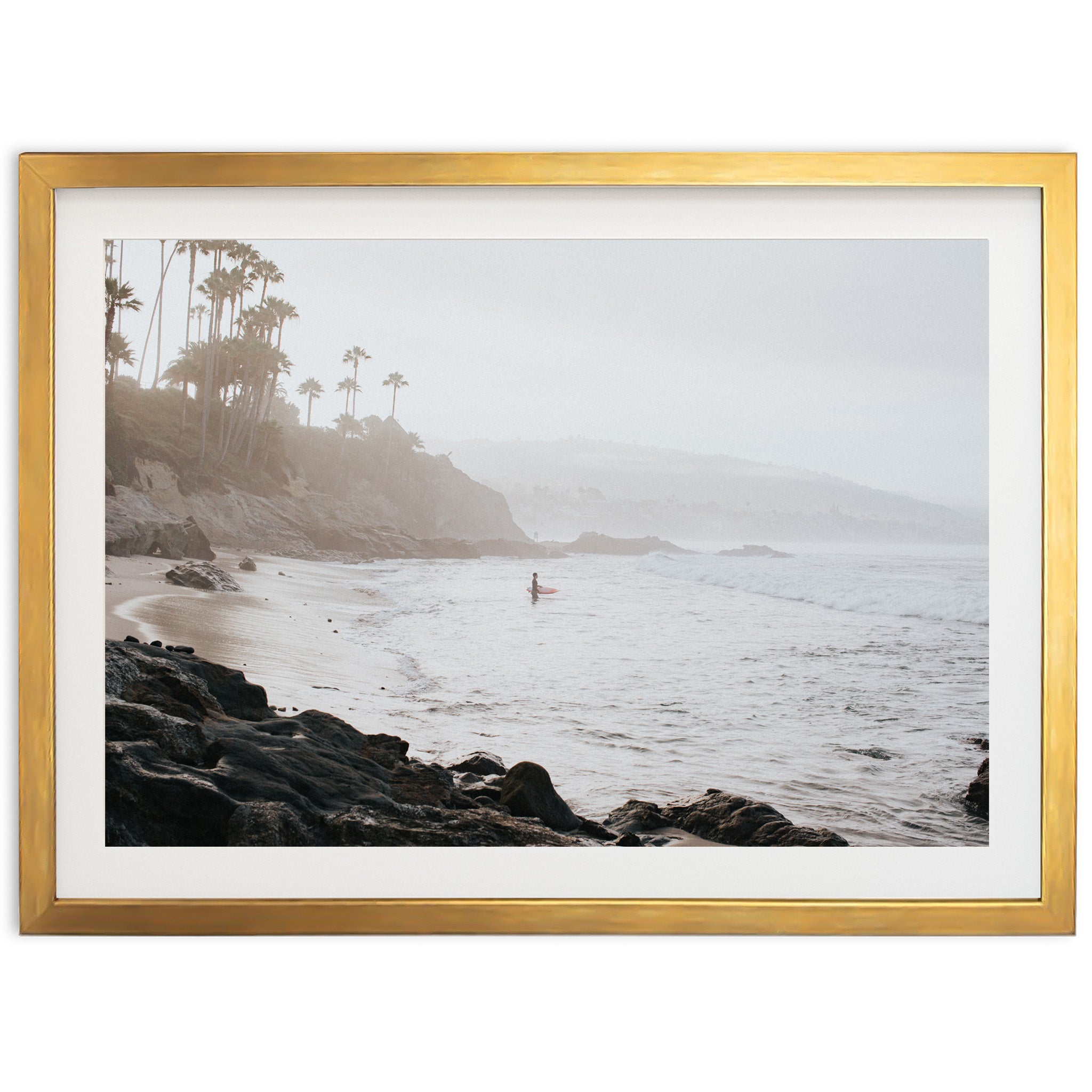 a picture of a person standing in the ocean