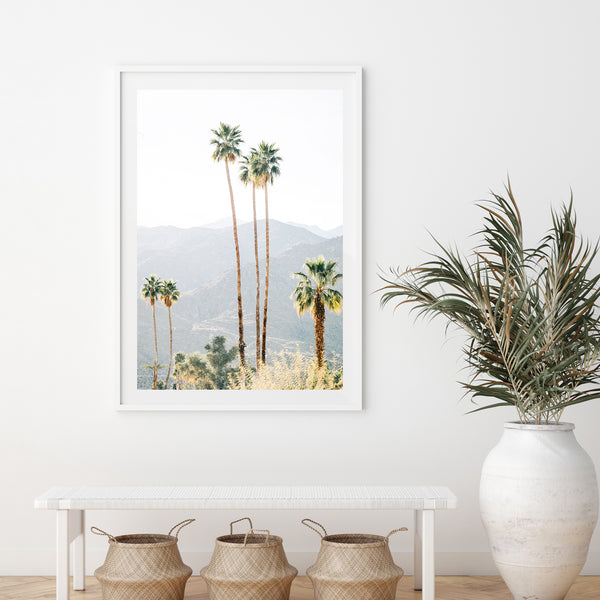 a picture of palm trees in a white room