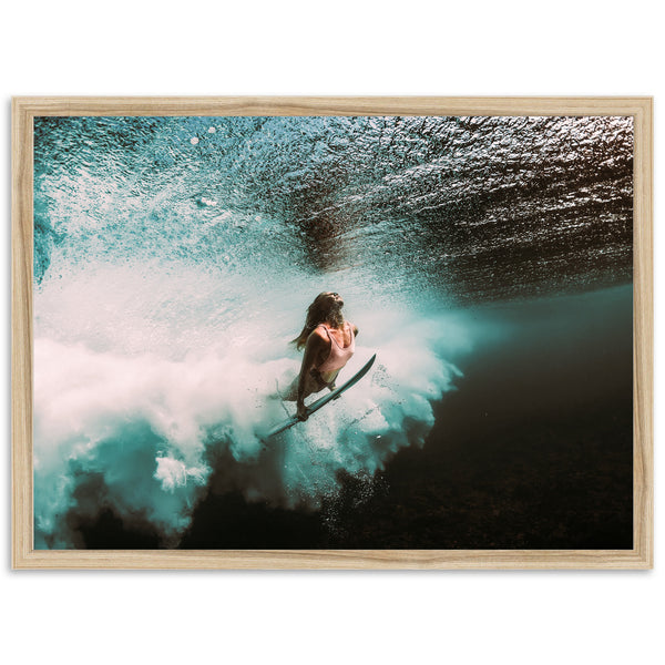 a person riding a surfboard on a wave in the ocean