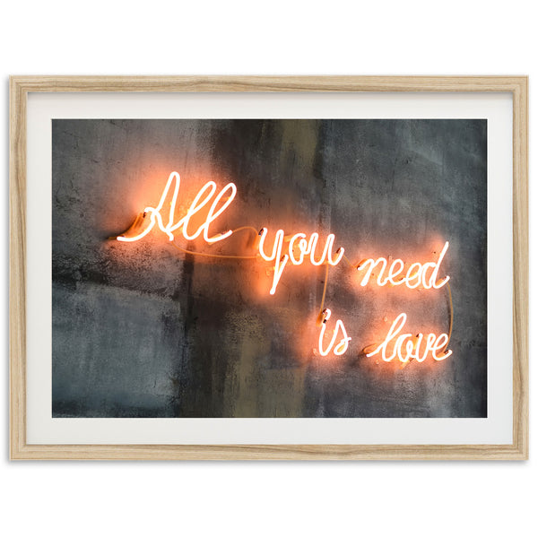 a picture of a neon sign that says all you need is love