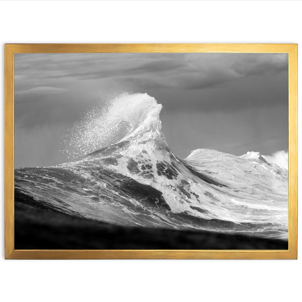 a black and white photo of a wave in the ocean