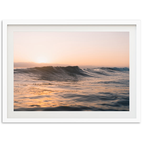 a picture of a sunset over the ocean