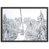 a black and white photo of a ski lift