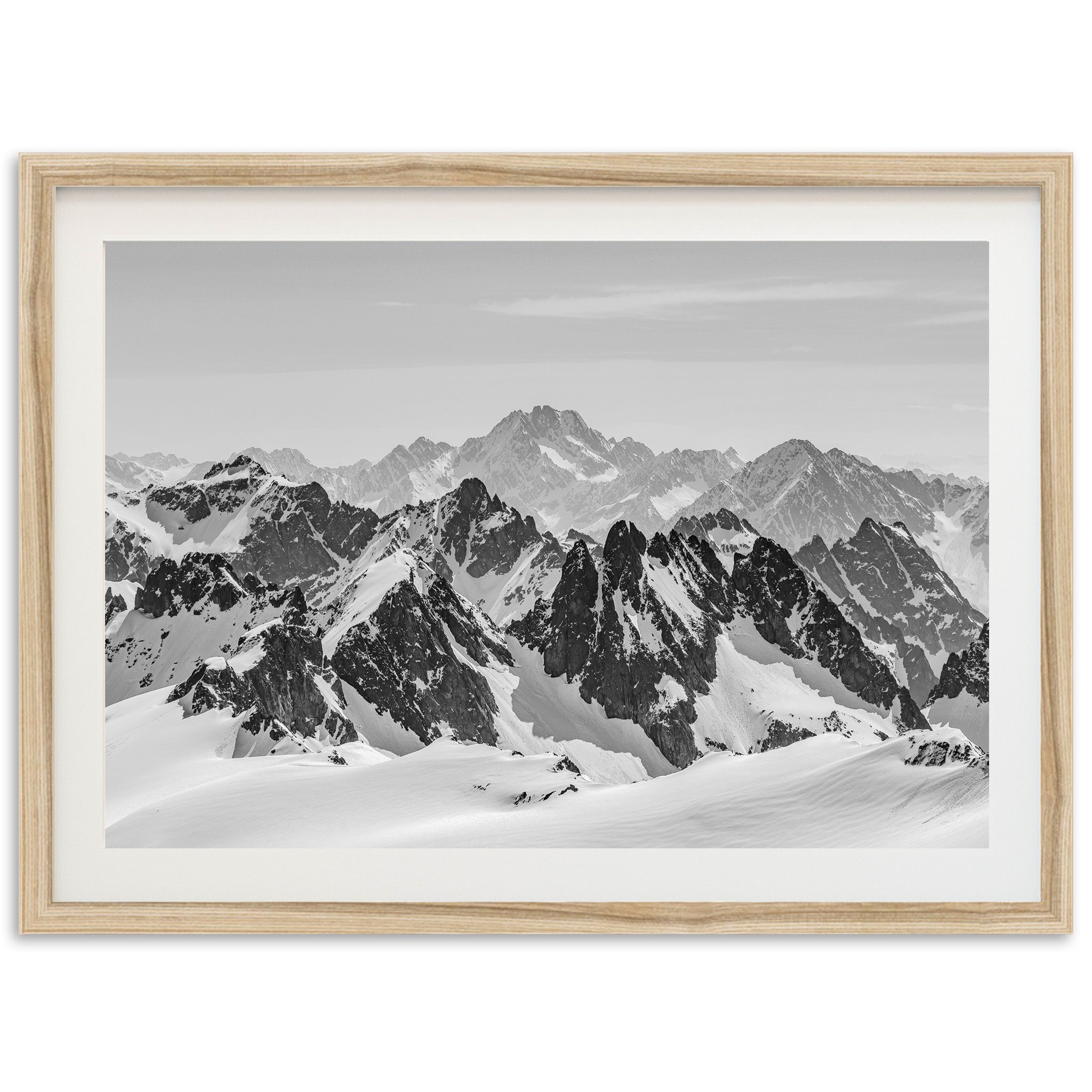 a black and white photo of a mountain range