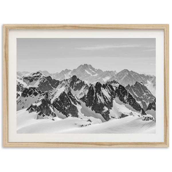 a black and white photo of a mountain range