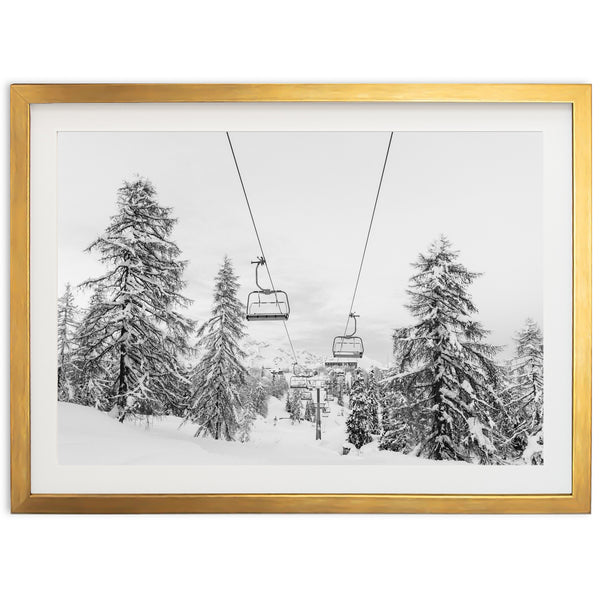 a black and white photo of a ski lift