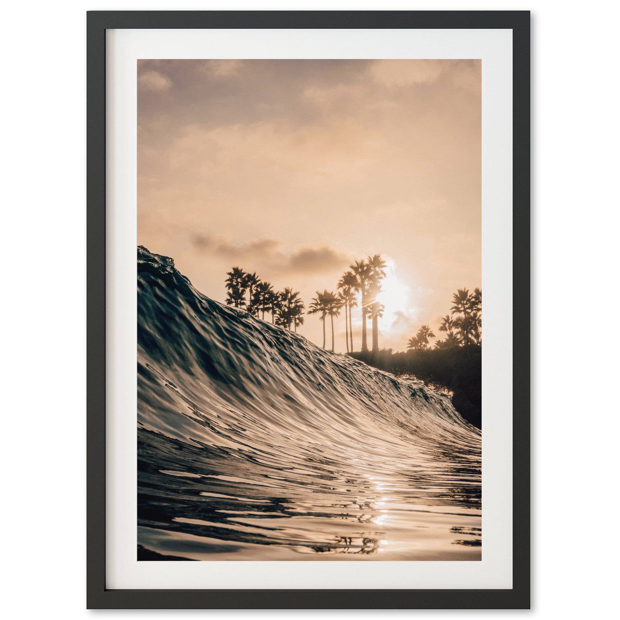 a picture of a wave in the ocean with palm trees in the background