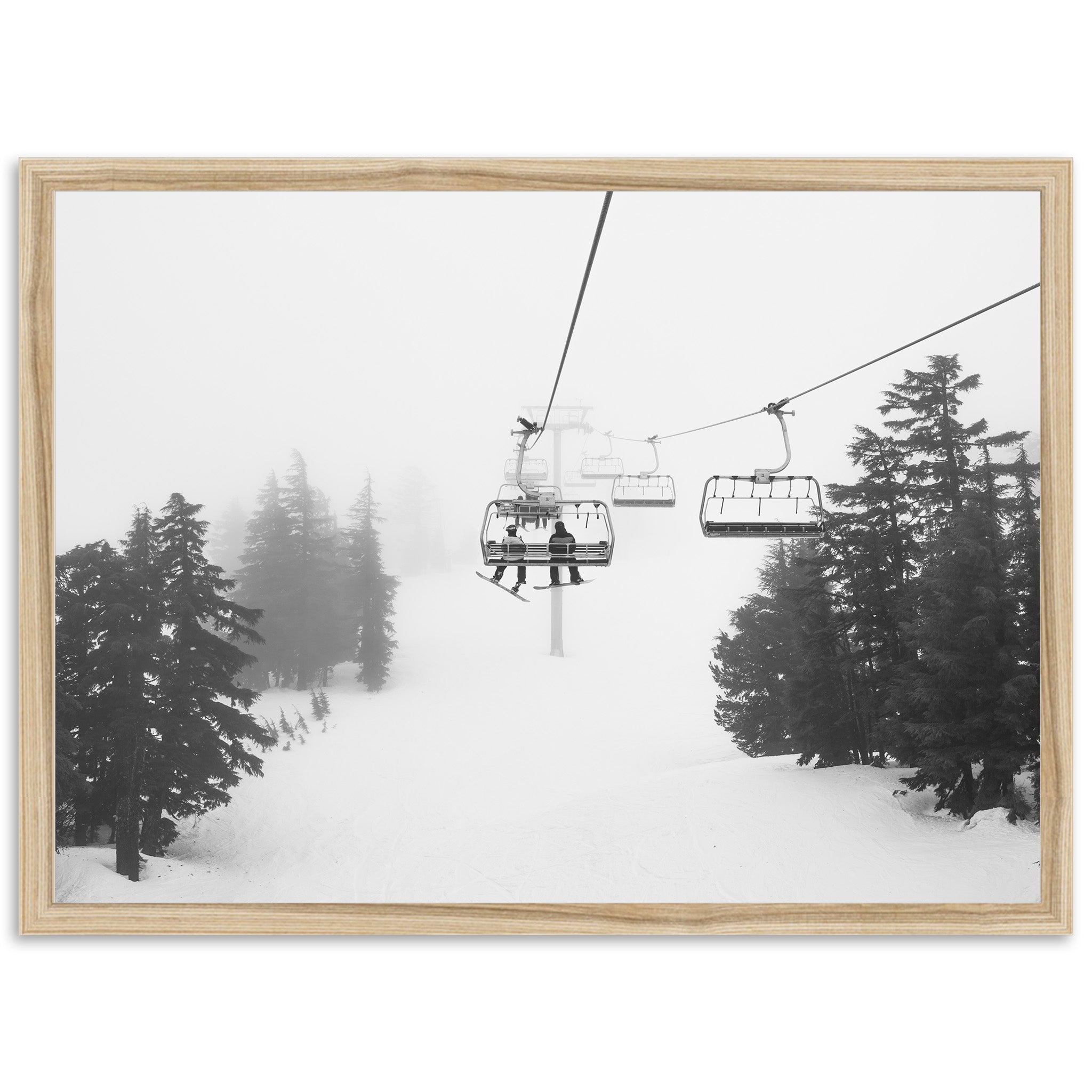 a black and white photo of a ski lift