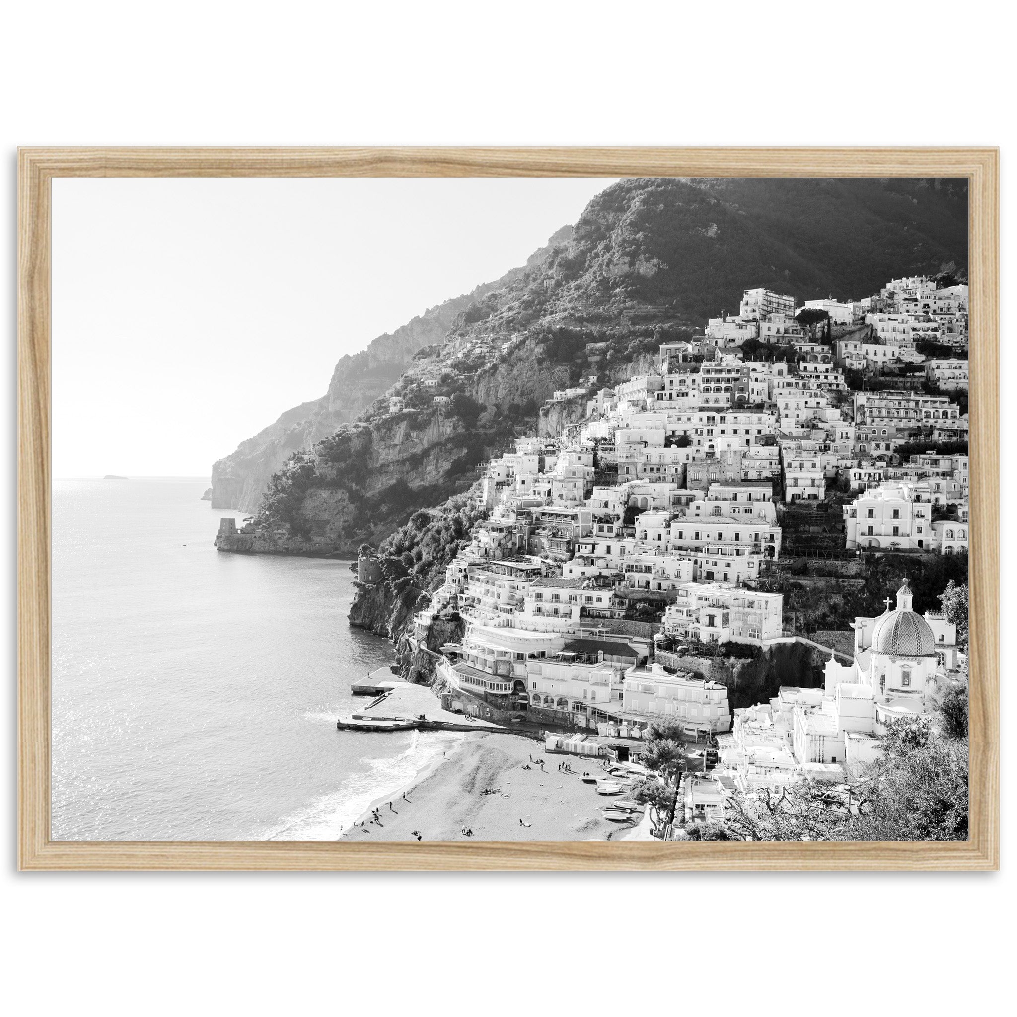 a black and white photo of a village on a cliff