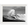 a black and white photo of a wave in the ocean