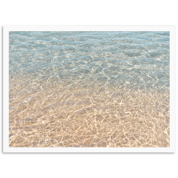 a picture of a beach with water and sand