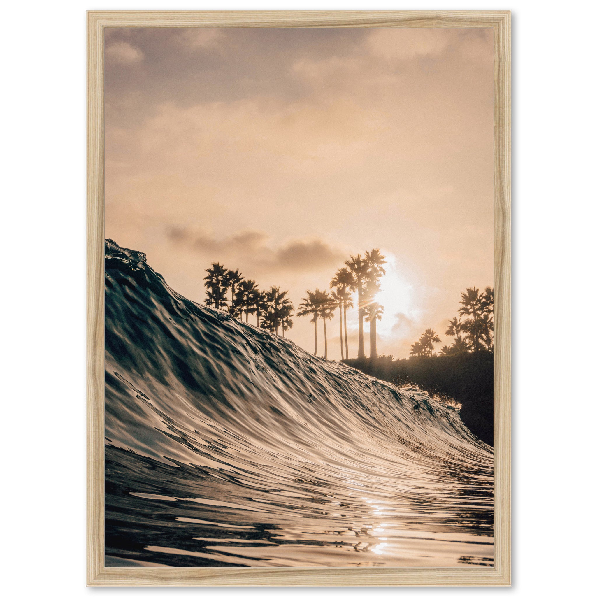 a picture of a wave in the ocean with palm trees in the background