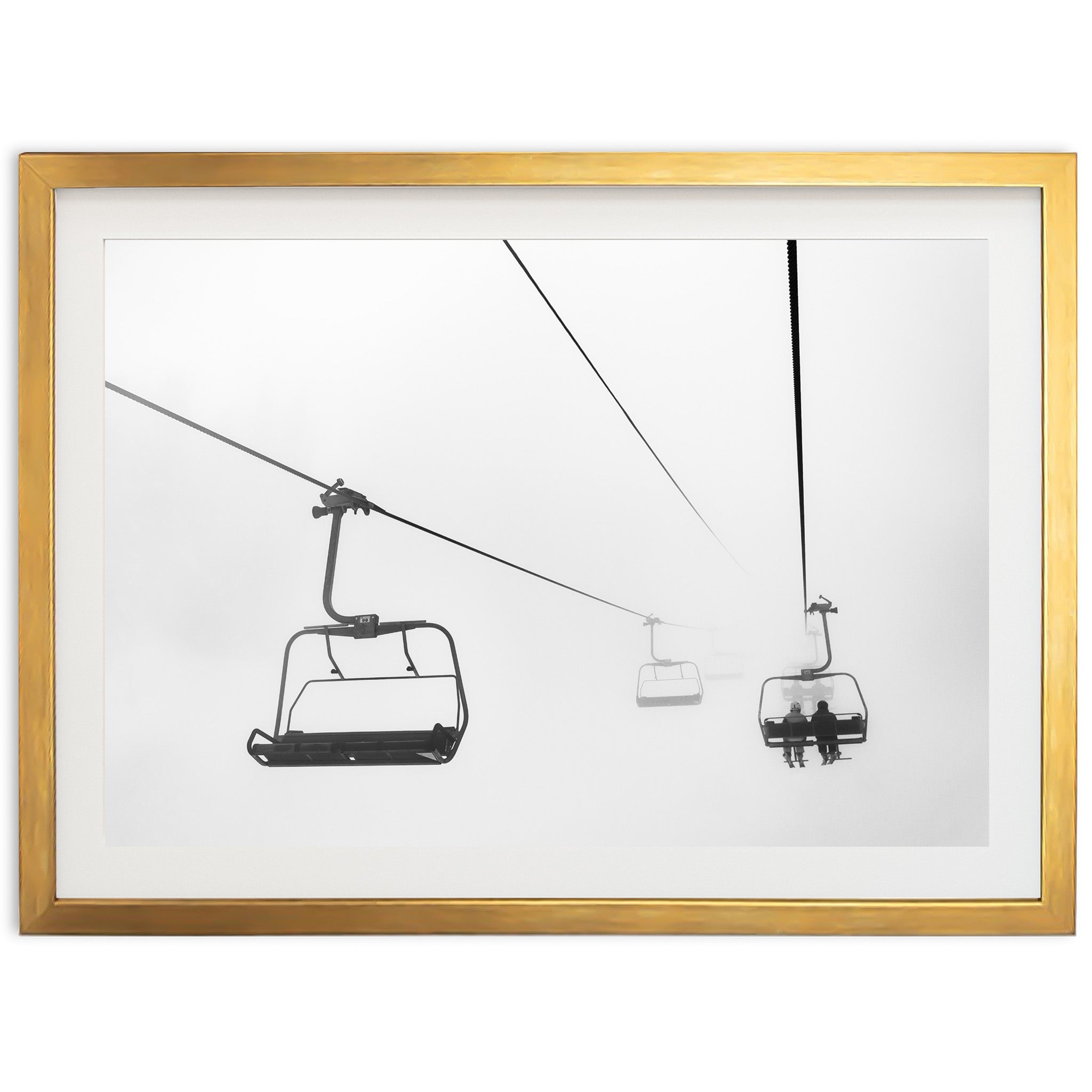 a black and white photo of a ski lift