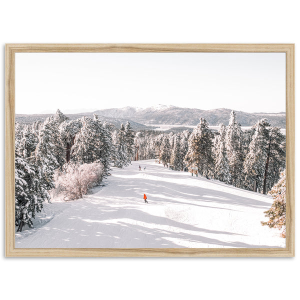 a picture of a person skiing down a hill