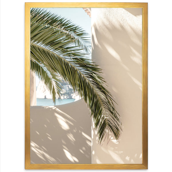 a palm tree in front of a mirror