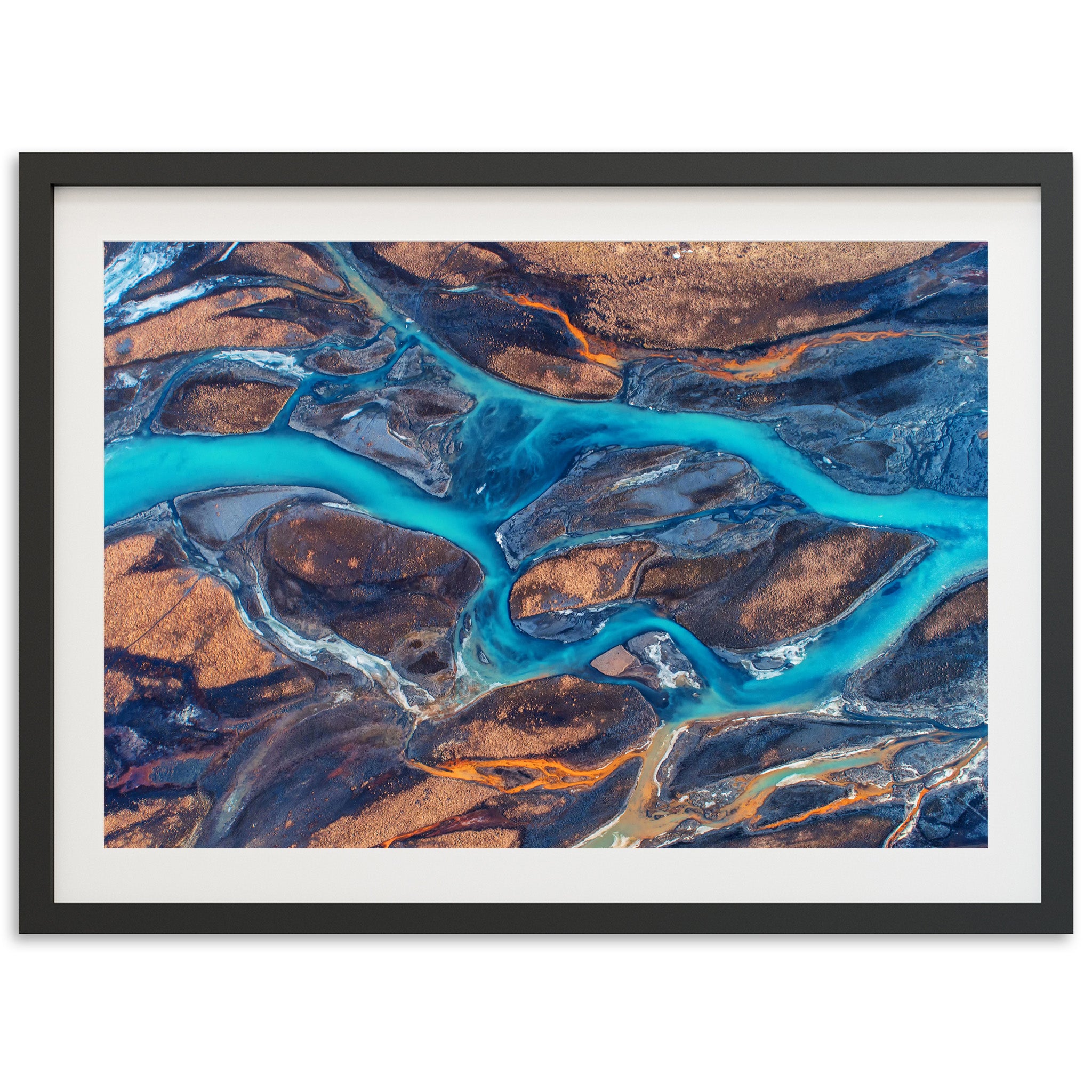 an aerial view of a river flowing through land