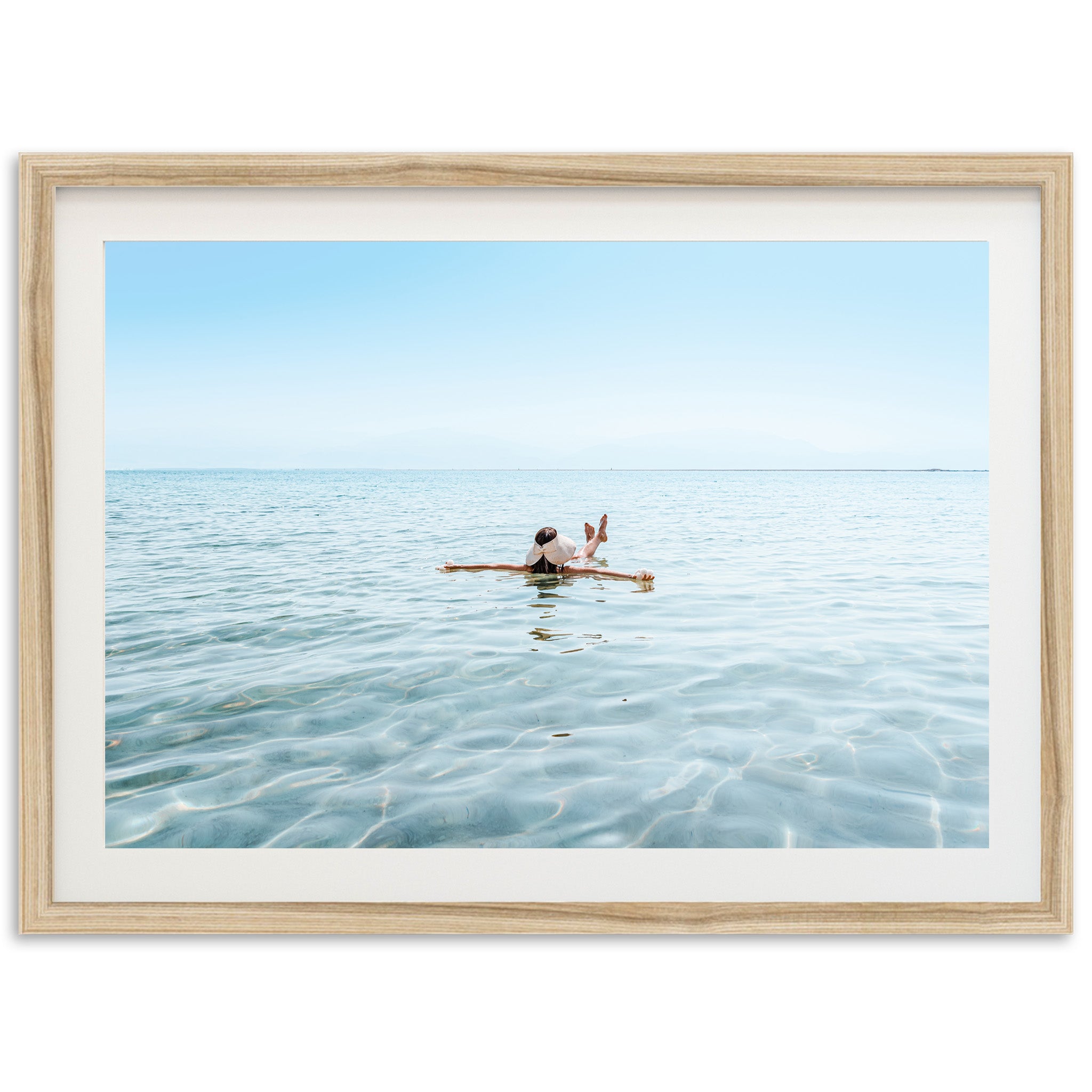 a person in the water on a surfboard