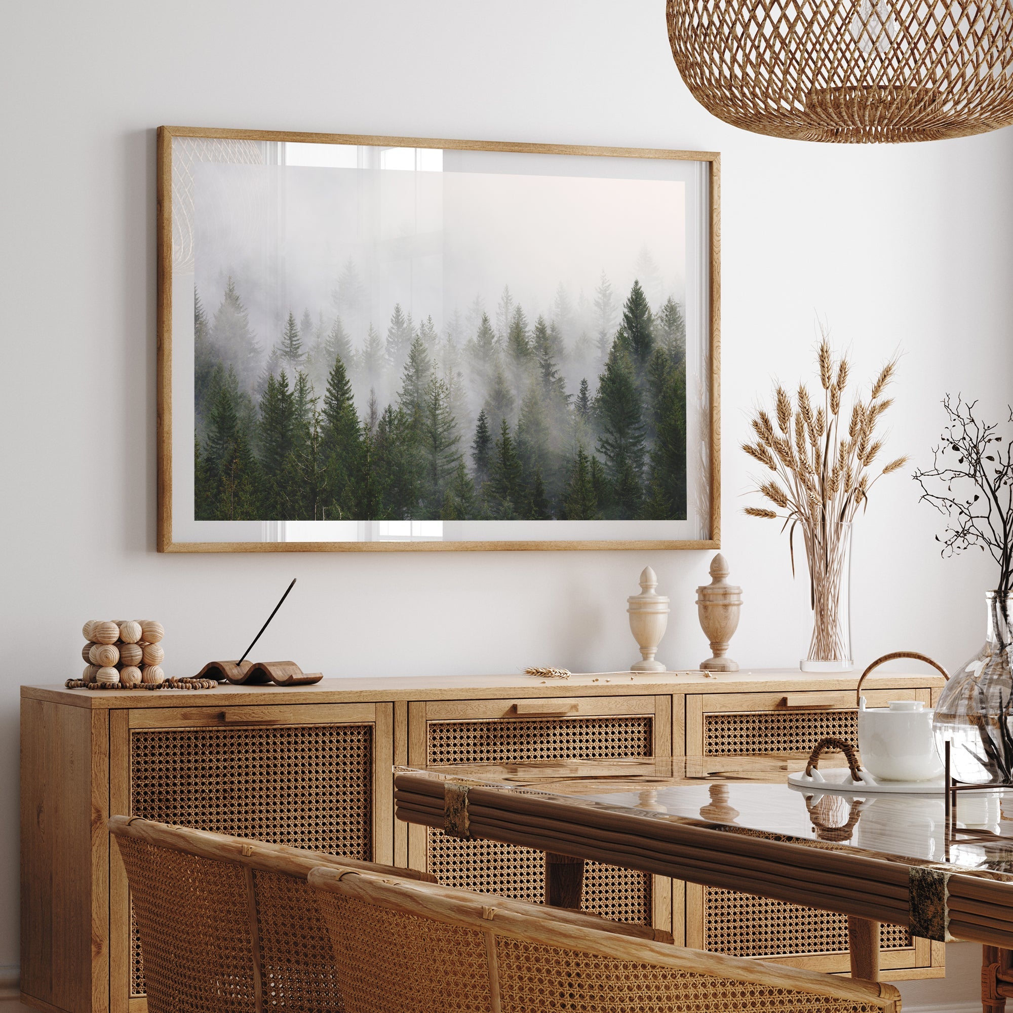 a painting hanging on a wall above a dining room table