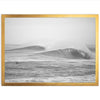 a black and white photo of a surfer riding a wave