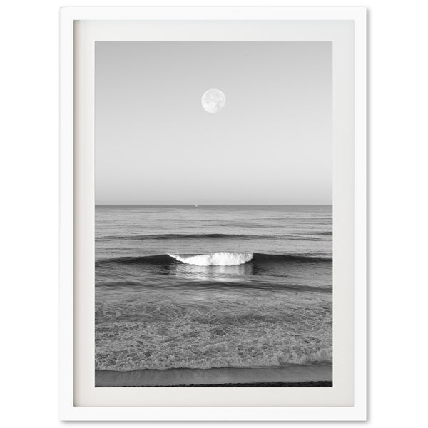 a black and white photo of a wave in the ocean