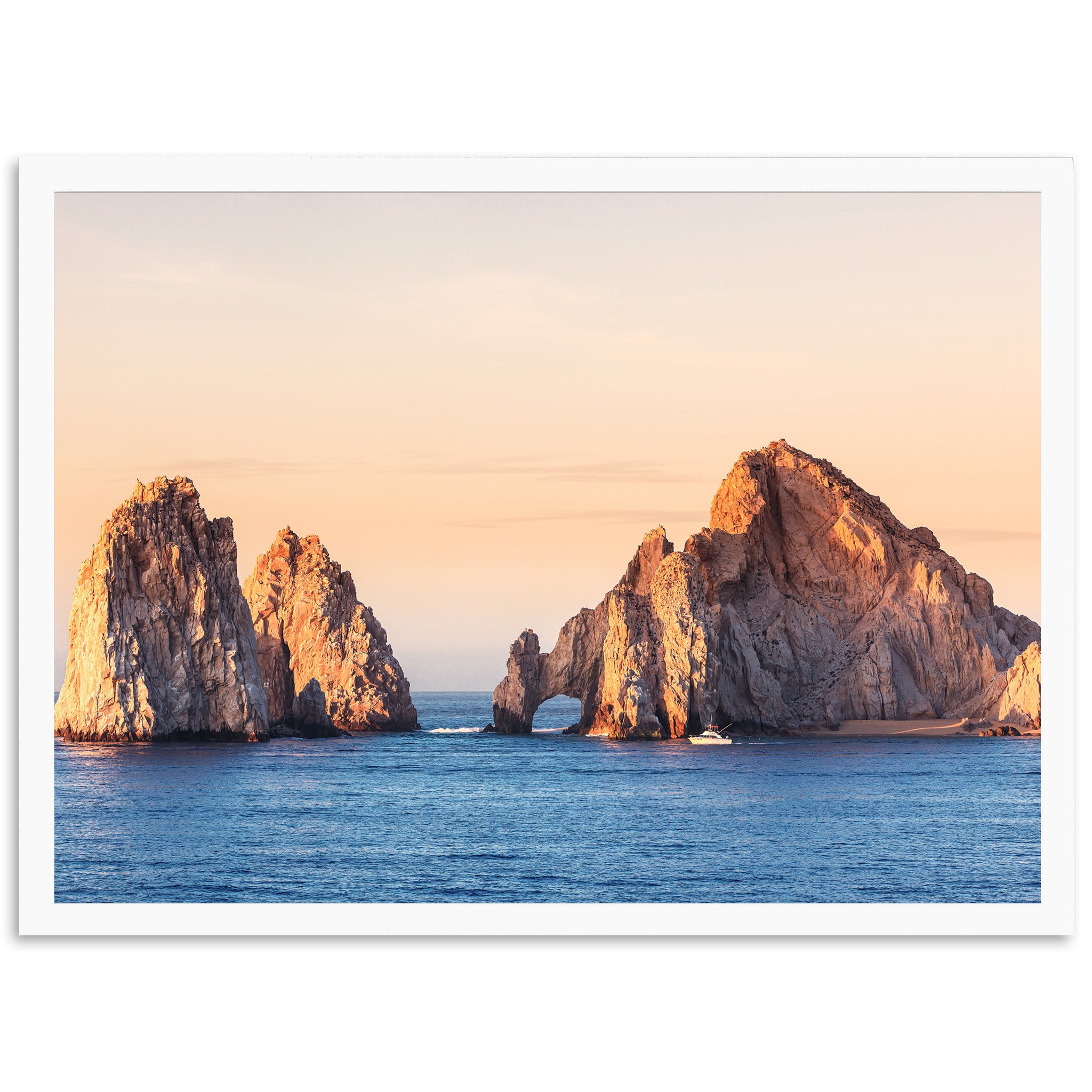 a large rock formation in the middle of a body of water