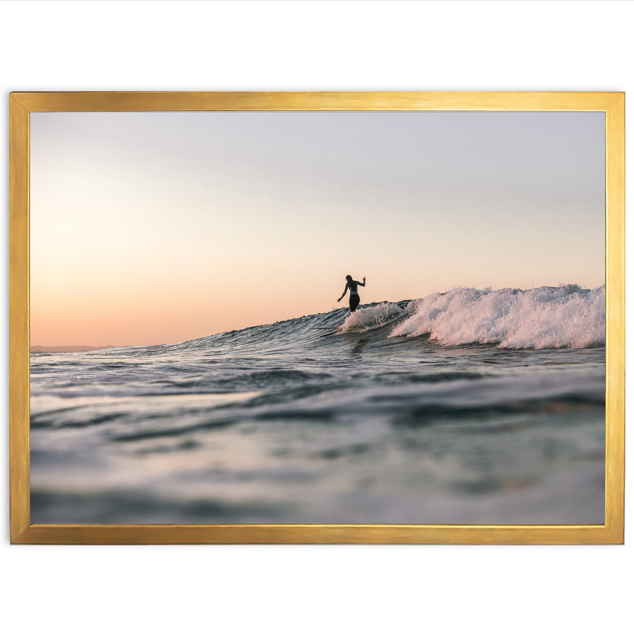 a man riding a wave on top of a surfboard