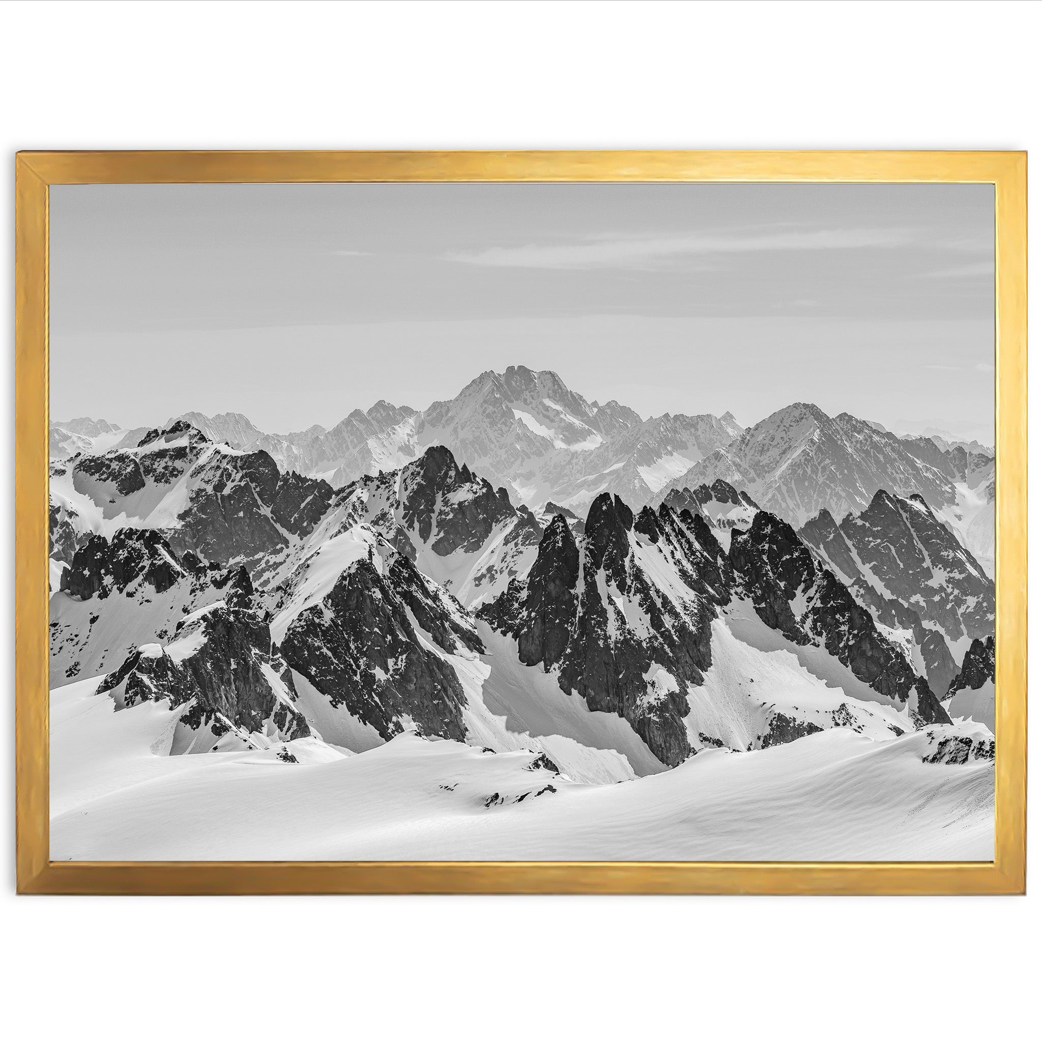 a black and white photo of a mountain range