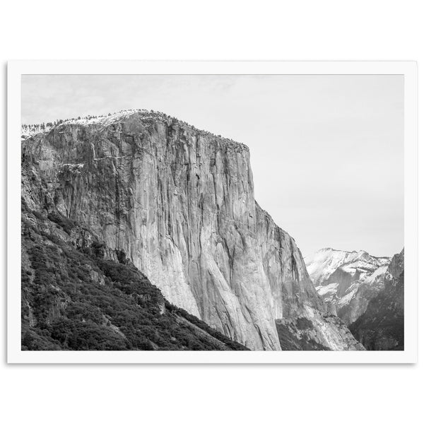 a black and white photo of a mountain