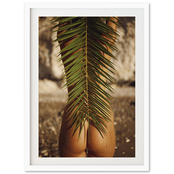 a picture of a palm tree with a woman's butt