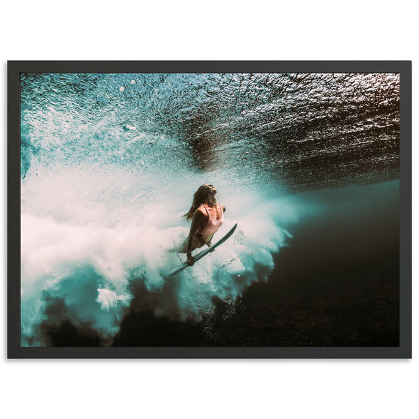 a person riding a surfboard on a wave in the ocean