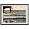 a picture of a surfer riding a wave