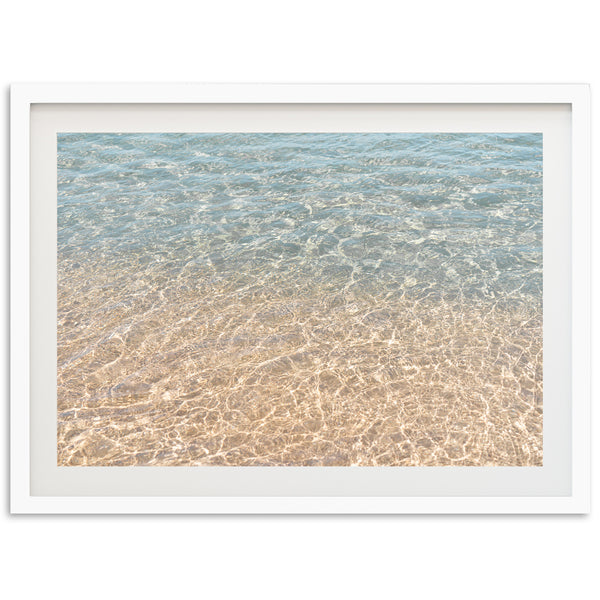 a picture of the water and sand of a beach