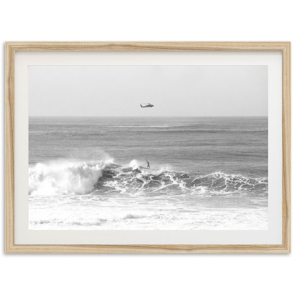 a black and white photo of a boat in the ocean