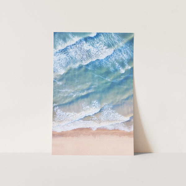 a painting of a beach with waves coming in