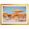 a group of chairs and umbrellas on a beach