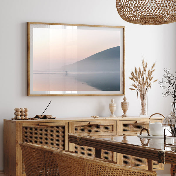 a picture of a living room with a table and chairs