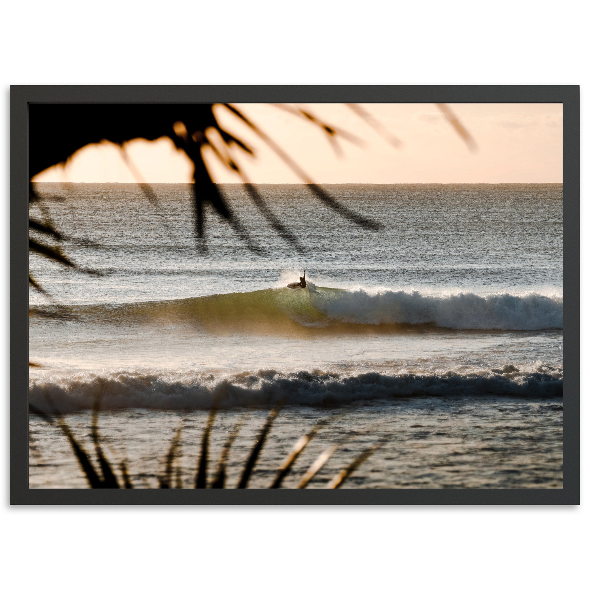 a person riding a wave on top of a surfboard