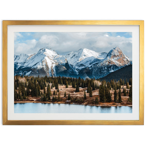 a picture of a mountain range with a lake in the foreground