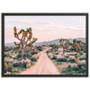 a dirt road in the middle of a desert