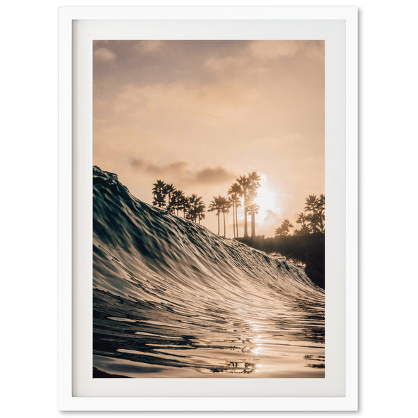 a picture of a wave with palm trees in the background